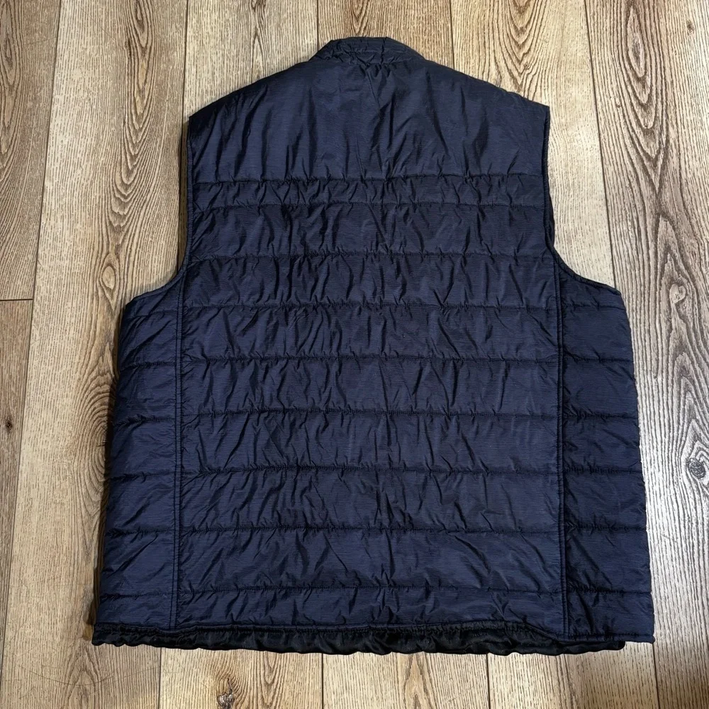 Marc Anthony dark blue zip up puffer vest, front pockets, standing collar, XXL.
